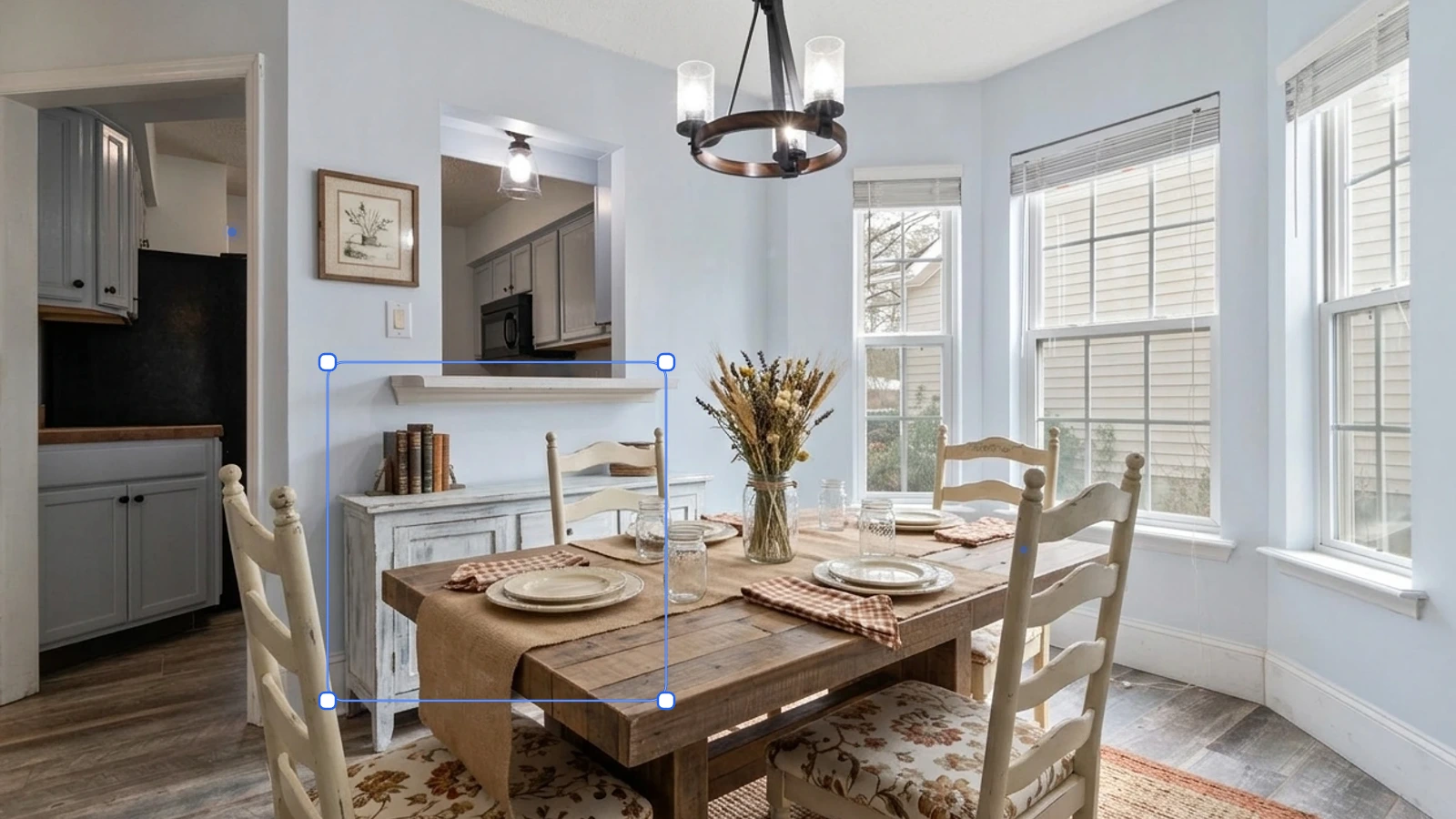 A staged dining room with an AI selection box highlighting furniture